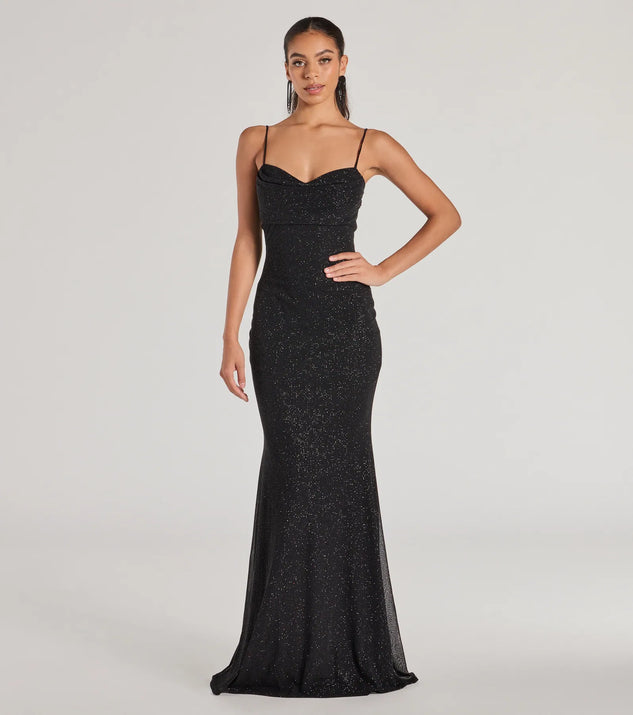 Turn heads at Prom 2025 in this black prom dress, where statement-making details meet the iconic style of the Aileen Sleeveless Glitter Mesh Mermaid Dress .