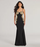 Turn heads at Prom 2025 in this black prom dress, where statement-making details meet the iconic style of the Susan Sweetheart Applique Crepe Mermaid Formal Dress .