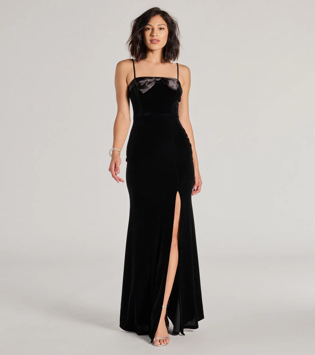Turn heads at Prom 2025 in this black prom dress, where statement-making details meet the iconic style of the Gracie Velvet and Bow High Slit Mermaid Dress .