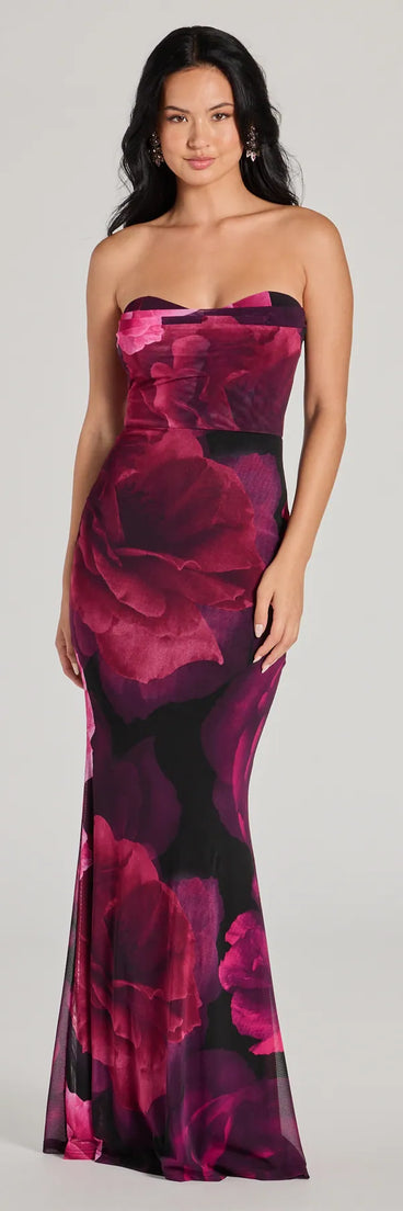 Turn heads at Prom 2025 in this magenta prom dress, where statement-making details meet the iconic style of the Julianna Floral Mesh Strapless Mermaid Dress .