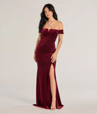 Turn heads at Prom 2025 in this burgundy prom dress, where statement-making details meet the iconic style of the Alayna Velvet Off-The-Shoulder Mermaid Dress .