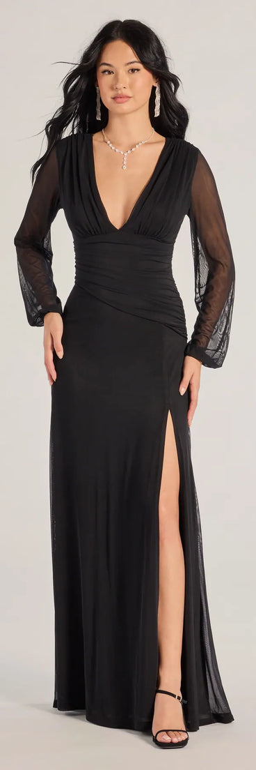Turn heads at Prom 2025 in this black prom dress, where statement-making details meet the iconic style of the Rayne Mesh Long Sleeve A-Line Formal Dress .