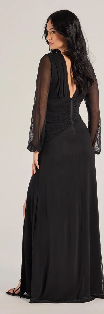 The Rayne Mesh Long Sleeve A-Line Formal Dress is a show-stopping black prom dress, offering a sleek, slimming silhouette that enhances your natural beauty for an unforgettable night.