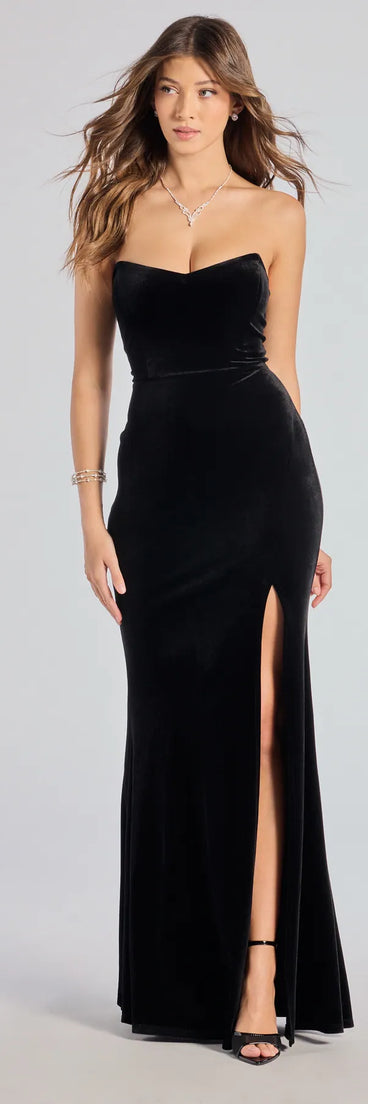Feel instantly put-together in the Margo Velvet Strapless High Slit Mermaid Dress in black, a summer wedding guest dress designed for confident style and all-out celebration.