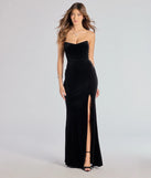 Turn heads at Prom 2025 in this black prom dress, where statement-making details meet the iconic style of the Margo Velvet Strapless High Slit Mermaid Dress .