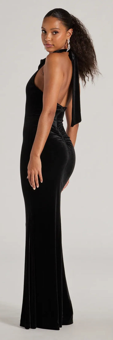 Celebrate in style with the Nara Long Velvet Halter Mermaid Dress, a black formal wedding guest dress featuring an elegant silhouette and luxe details, perfect for a black-tie celebration.