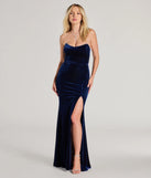Turn heads at Prom 2025 in this navy blue prom dress, where statement-making details meet the iconic style of the Margo Velvet Strapless High Slit Mermaid Dress .