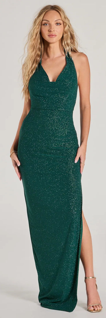 Turn heads at Prom 2025 in this hunter green prom dress, where statement-making details meet the iconic style of the Debra Halter Open Back Slim Glitter Formal Dress .