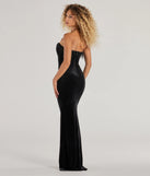 The Luisa Pearl Fringe Trim Velvet Corset Mermaid Dress is a show-stopping black prom dress, offering a sleek, slimming silhouette that enhances your natural beauty for an unforgettable night.