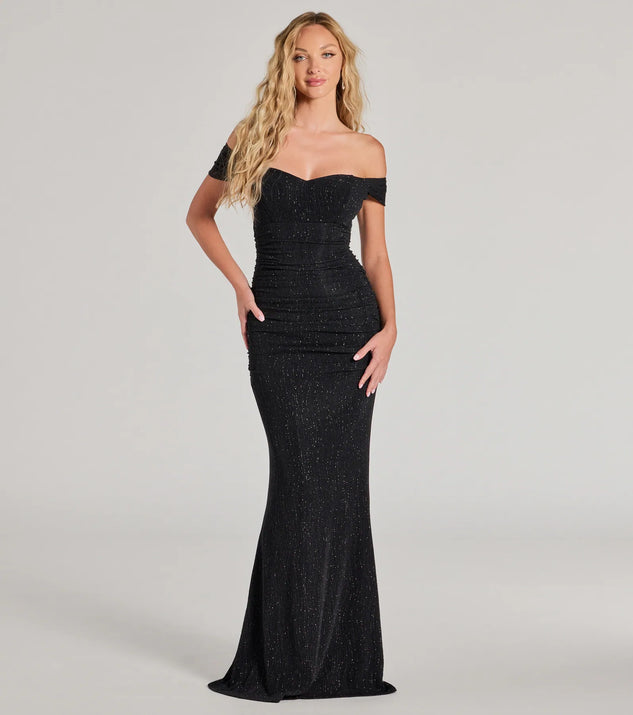 Turn heads at Prom 2025 in this black prom dress, where statement-making details meet the iconic style of the Ines Glitter Lurex Off-The-Shoulder Mermaid Dress .