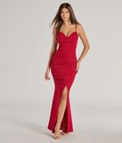 Turn heads at Prom 2025 in this red prom dress, where statement-making details meet the iconic style of the Mila Cowl Neck Wrap Slit Mermaid Glitter Formal Dress .