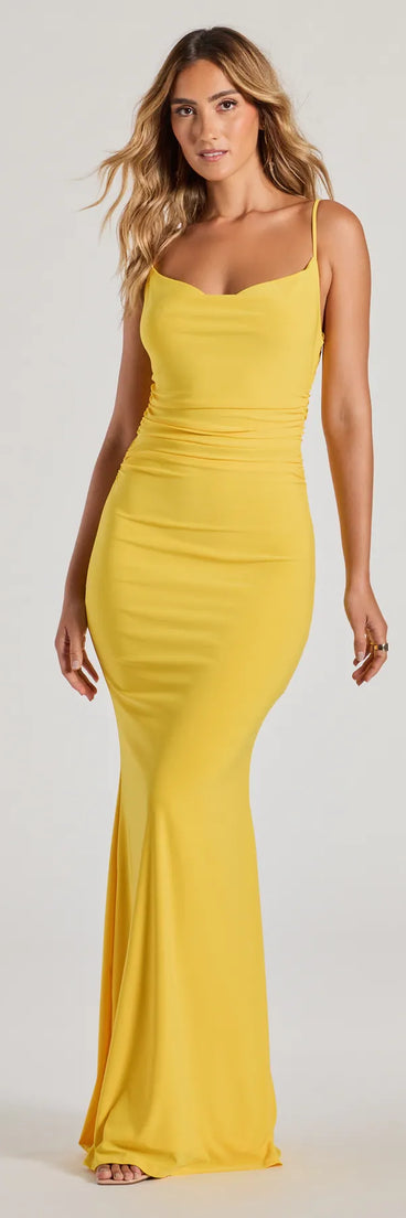 Turn heads at HOCO 2025 in this yellow homecoming dress, where statement-making details meet the iconic style of the Lilliana Cowl Neck Knit Mermaid Dress.