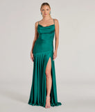 Turn heads at Prom 2025 in this hunter green prom dress, where statement-making details meet the iconic style of the Alaia Cross-Back Pleated A-Line Formal Dress .