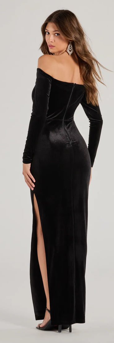 A stunning pick for an engagement photoshoot outfit or autumn wedding guest dress, this fall formal dress showcases the Rosalyn Velvet Off-The Shoulder Long Sleeve Column Dress in black with a graceful silhouette that captures the moment.