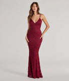 Turn heads at Prom 2025 in this wine prom dress, where statement-making details meet the iconic style of the Briella Glitter Lace Cross-Back Mermaid Dress .