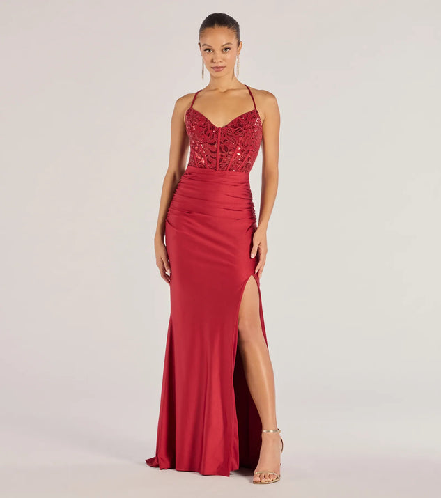 Turn heads at Prom 2025 in this red prom dress, where statement-making details meet the iconic style of the Gemma Sequin Embroidered Lace-Up Mermaid Dress .