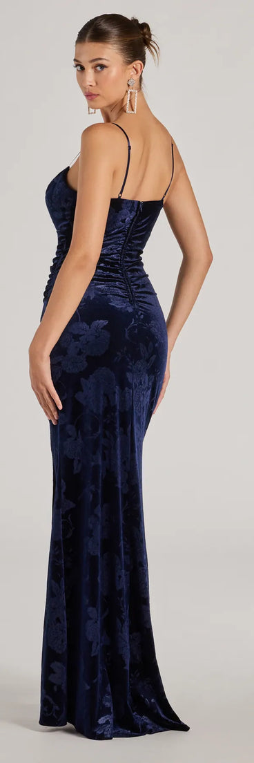 Own the spotlight in the Anisa Sleeveless Floral Velvet Mermaid Dress, a navy blue formal dress crafted to deliver luxe style for autumn weddings, Military Balls, or any special event.