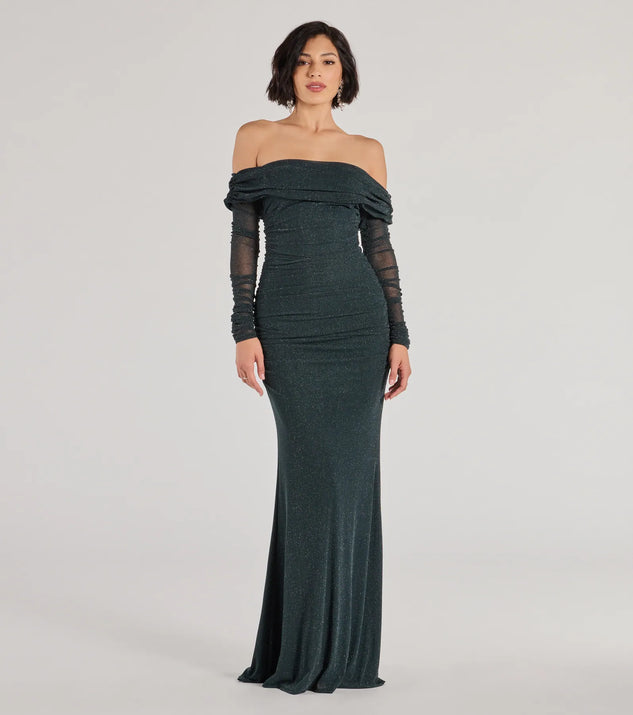 Turn heads at Prom 2025 in this hunter green prom dress, where statement-making details meet the iconic style of the Tova Off The Shoulder Glitter Mermaid Dress .