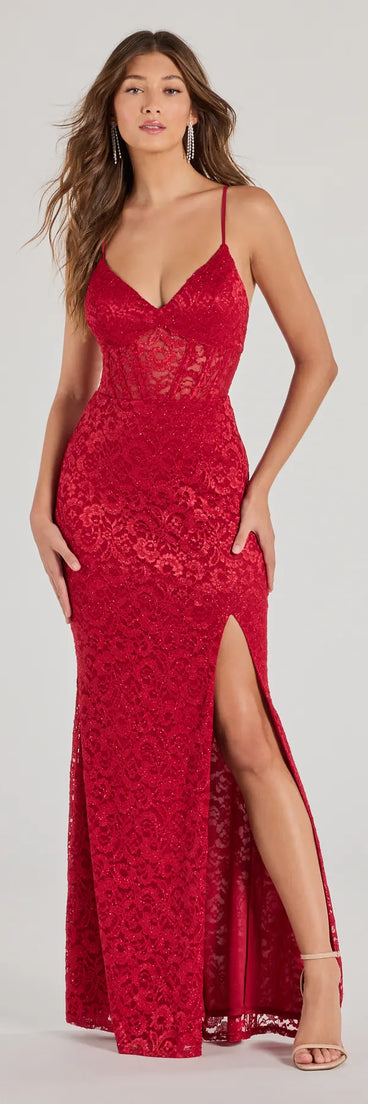 Turn heads at Prom 2025 in this red prom dress, where statement-making details meet the iconic style of the Teresa Lace Up Corset Mermaid Lace Formal Dress .
