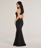 The Emmaline Lace Trim Cutout Crepe Mermaid Dress is a show-stopping black prom dress, offering a sleek, slimming silhouette that enhances your natural beauty for an unforgettable night.