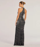 The Sloane Rhinestone And Faux Pearl Mermaid Dress is a show-stopping black prom dress, offering a sleek, slimming silhouette that enhances your natural beauty for an unforgettable night.