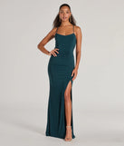 Turn heads at Prom 2025 in this hunter green prom dress, where statement-making details meet the iconic style of the Ashley Sleeveless Bow Mermaid Formal Dress .