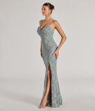 Revamp your 2025 wardrobe with this chic addition, the Romina Lace Cowl Neck High Slit Mermaid Dress in sage green, perfect for elevating your style in the new year.