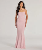Turn heads at Prom 2025 in this pink prom dress, where statement-making details meet the iconic style of the Gwendolyn Glitter Knit Bow-Back Mermaid Dress .