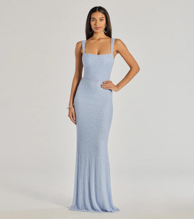 Turn heads at Prom 2025 in this light blue prom dress, where statement-making details meet the iconic style of the Kimia Long Beaded Lace-Up Slim Dress .
