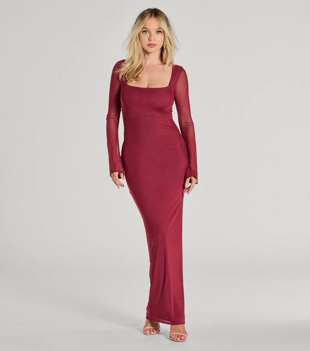 Turn heads at Prom 2025 in this burgundy prom dress, where statement-making details meet the iconic style of the Becka Formal Mesh High Slit Long Dress .
