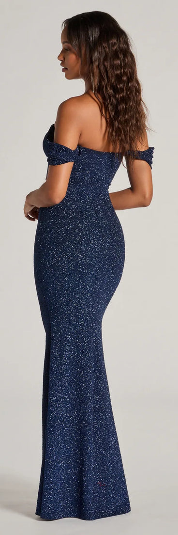 A stunning pick for an engagement photoshoot outfit or autumn wedding guest dress, this fall formal dress showcases the Tamara Off-The-Shoulder Mermaid Glitter Formal Dress in navy blue with a graceful silhouette that captures the moment.