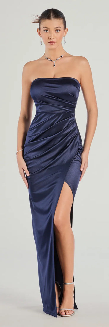 Turn heads at Prom 2025 in this navy blue prom dress, where statement-making details meet the iconic style of the Lauren Strapless Wrap Slim Satin Formal Dress .
