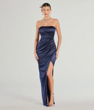 Turn heads at Prom 2025 in this navy blue prom dress, where statement-making details meet the iconic style of the Lauren Strapless Wrap Slim Satin Formal Dress .