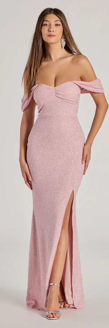 Turn heads at Prom 2025 in this pink prom dress, where statement-making details meet the iconic style of the Tamara Off-The-Shoulder Mermaid Glitter Formal Dress .
