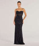Turn heads at Prom 2025 in this black prom dress, where statement-making details meet the iconic style of the Alessandra Sleeveless Flocked Velvet Mermaid Dress .