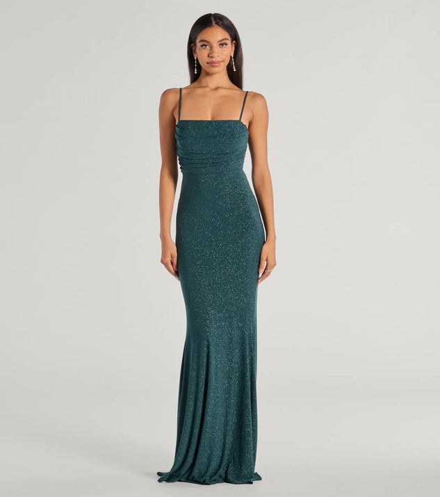 Turn heads at Prom 2025 in this hunter green prom dress, where statement-making details meet the iconic style of the Colleen Lace Up Mermaid Glitter Formal Dress .