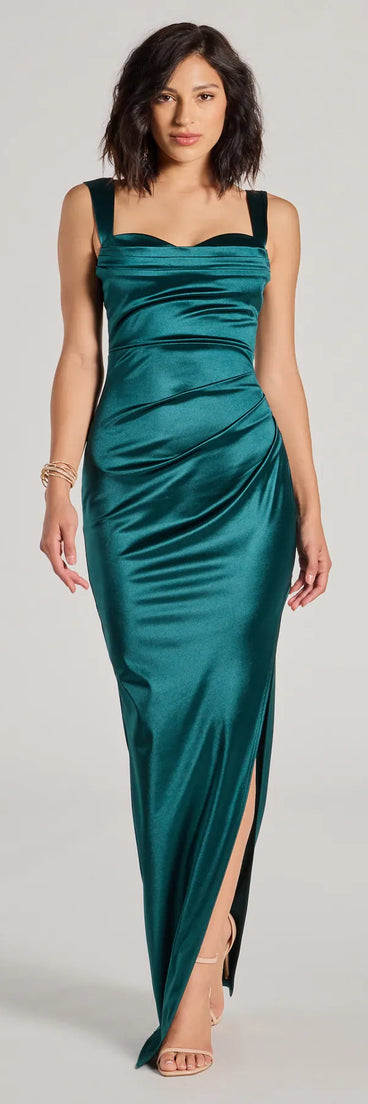 Turn heads at HOCO 2025 in this hunter green homecoming dress, where statement-making details meet the iconic style of the Kirsten Satin Cowl Neck High Slit Formal Dress.