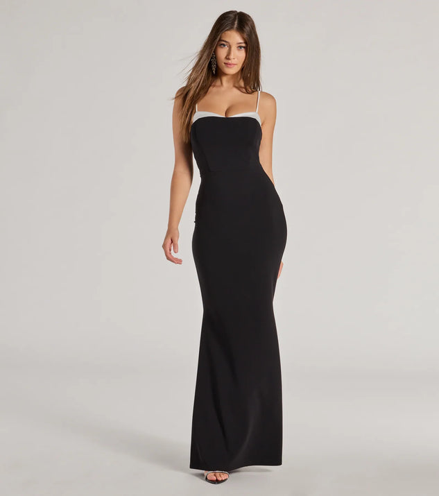 Turn heads at Prom 2025 in this black prom dress, where statement-making details meet the iconic style of the Irie Contrast Trim Long Crepe Mermaid Dress .