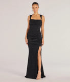 Turn heads at Prom 2025 in this black prom dress, where statement-making details meet the iconic style of the Drew Open Back Glitter Mermaid Dress .