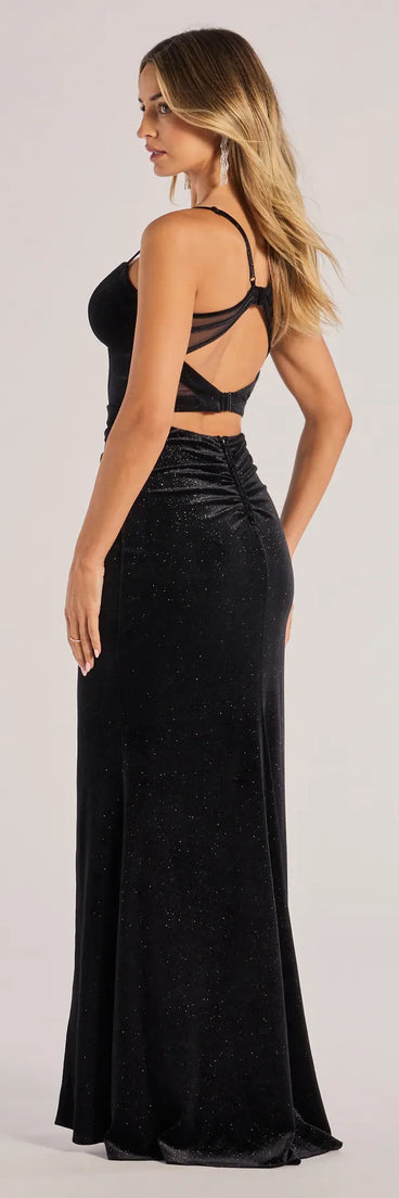 The Giorgina Velvet Glitter Corset Mermaid Dress is a show-stopping black prom dress, offering a sleek, slimming silhouette that enhances your natural beauty for an unforgettable night.