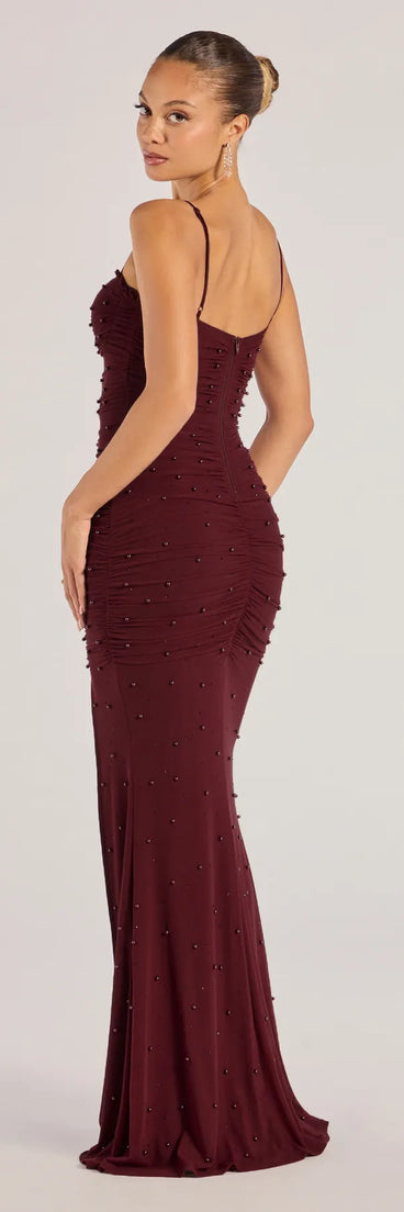 Milena Faux Pearl Mesh High Slit Mermaid Dress in burgundy, a stylish red dress with a flattering fit and fabric that adds allure to your look, perfect for wedding guest attire, cocktail events, or making a bold statement on a date night.
