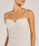 Make a bold statement in the Milena Faux Pearl Mesh High Slit Mermaid Dress in white, the perfect spring dress for weddings, cocktail hours, nights out, and/or seasonal celebrations.