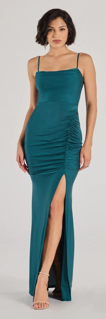 Turn heads at Prom 2025 in this hunter green prom dress, where statement-making details meet the iconic style of the Marsha Cowl Neck Mermaid Formal Dress .