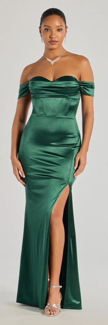Turn heads at Prom 2025 in this hunter green prom dress, where statement-making details meet the iconic style of the Laura Off-The-Shoulder Mermaid Satin Formal Dress .