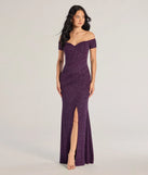 Turn heads at Prom 2025 in this purple prom dress, where statement-making details meet the iconic style of the Mimi Off The Shoulder Glitter Mermaid Corset Dress .