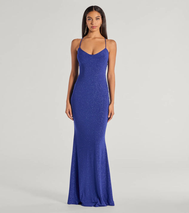 Turn heads at Prom 2025 in this royal blue prom dress, where statement-making details meet the iconic style of the Kyleigh Glitter Lace-Up Back Mermaid Dress .