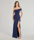 Turn heads at Prom 2025 in this navy blue prom dress, where statement-making details meet the iconic style of the Malani Glitter Knit One-Shoulder Slim Dress .
