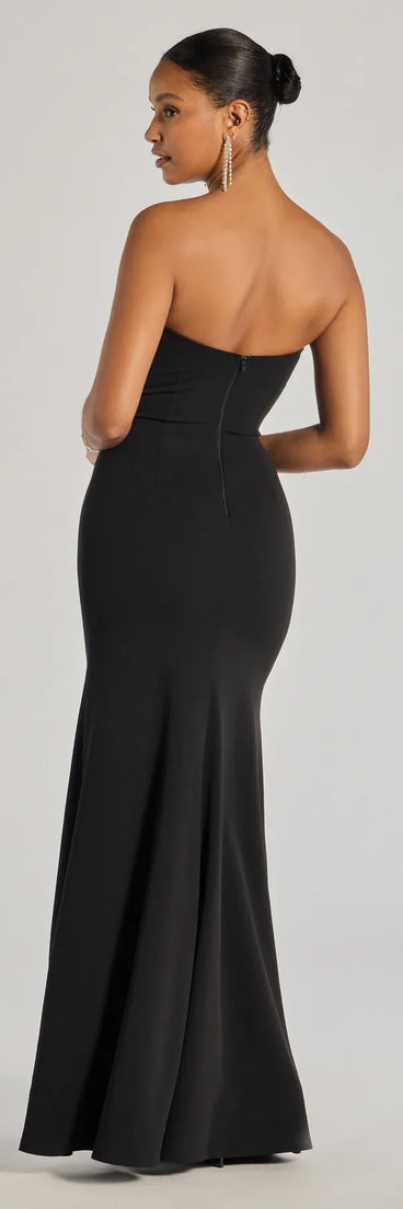The Aliana Strapless Corset Mermaid Dress is a show-stopping black prom dress, offering a sleek, slimming silhouette that enhances your natural beauty for an unforgettable night.