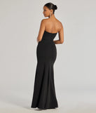 The Aliana Strapless Corset Mermaid Dress is a show-stopping black prom dress, offering a sleek, slimming silhouette that enhances your natural beauty for an unforgettable night.