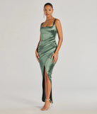 Turn heads at Prom 2025 in this sage green prom dress, where statement-making details meet the iconic style of the Rebecca Satin Slim-Fit Formal Dress .